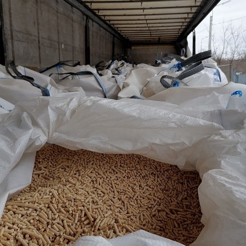 Industrial wood pellets 1 tonne bulk bags stacked in warehouse